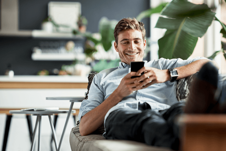 Blog man reclining cell phone Blog man reclining cell phone